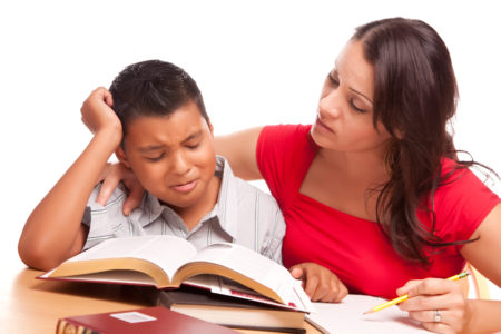 Frustrated Latino Son and Mother Study Homework School