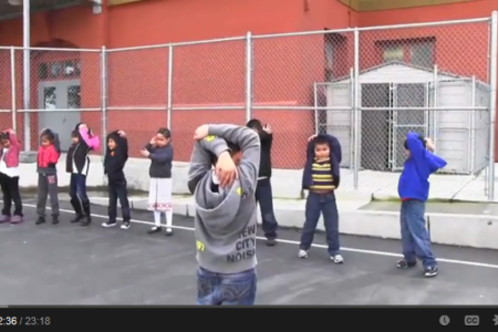 Students at Mission Ed Center stretch during PE time. (Source: Shape Up SF http://bit.ly/1bz9Mwn)