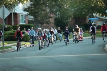 Students ride to school with Wolfie’s Bike Train