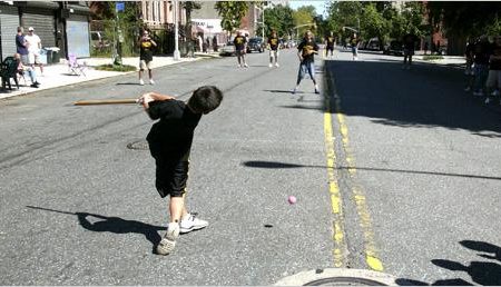 A Game of Stickball in New York City (Source: David Gonzalez/ The New York Times, http://nyti.ms/1ofjXzy)