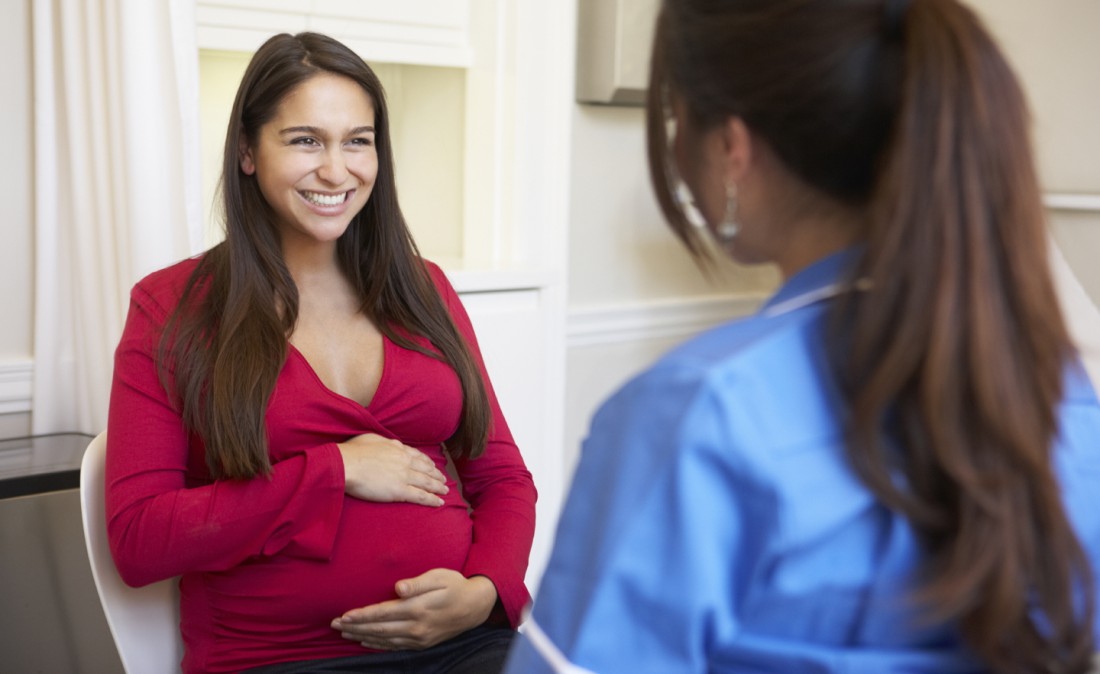 pregnant latina checkup baby