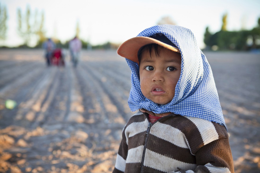 Latino farm boy in poverty and food insecurity