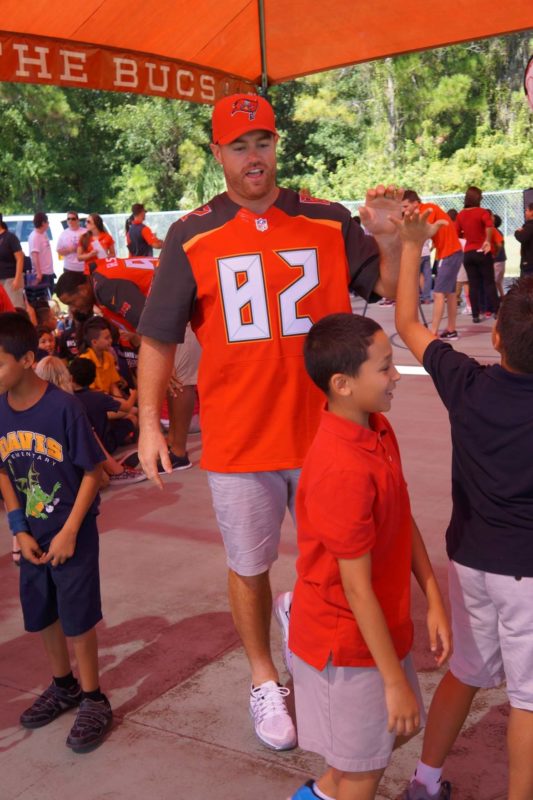 Bucs player, Brandon Myers greets children at Davis Elementary. (Source: Deborah Bostock-Kelley, http://bit.ly/1I1mSmx)