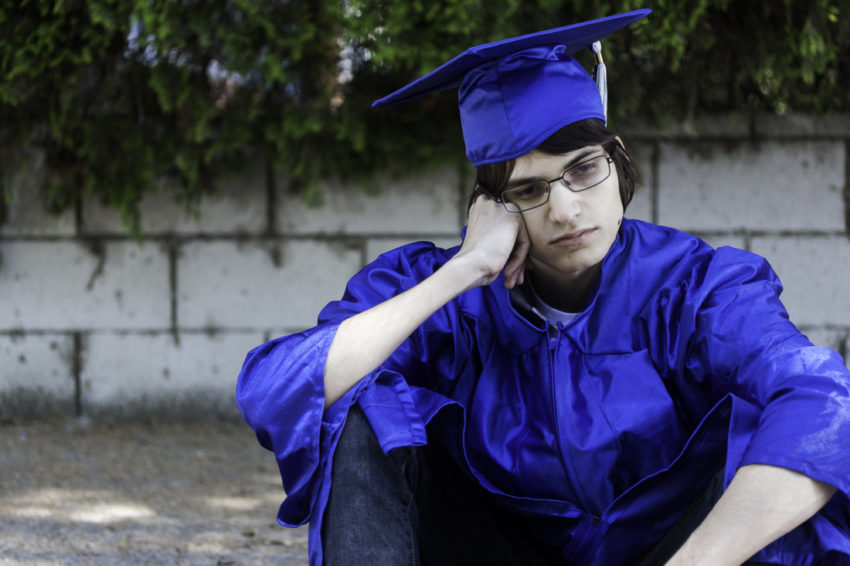Sad Graduate sitting