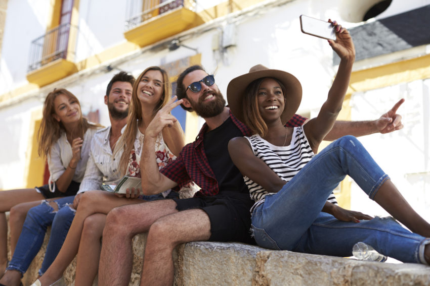 summer travel friends group selfie hispanic diverse