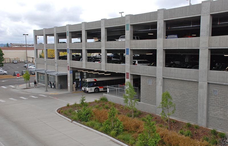 Clackamas Town Center Transit Center parking garage and departure bus stop Source Wikimedia Commons via Sightline