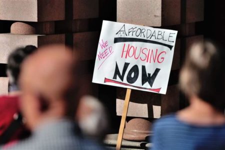 affordable housing sign (via Associated Press)