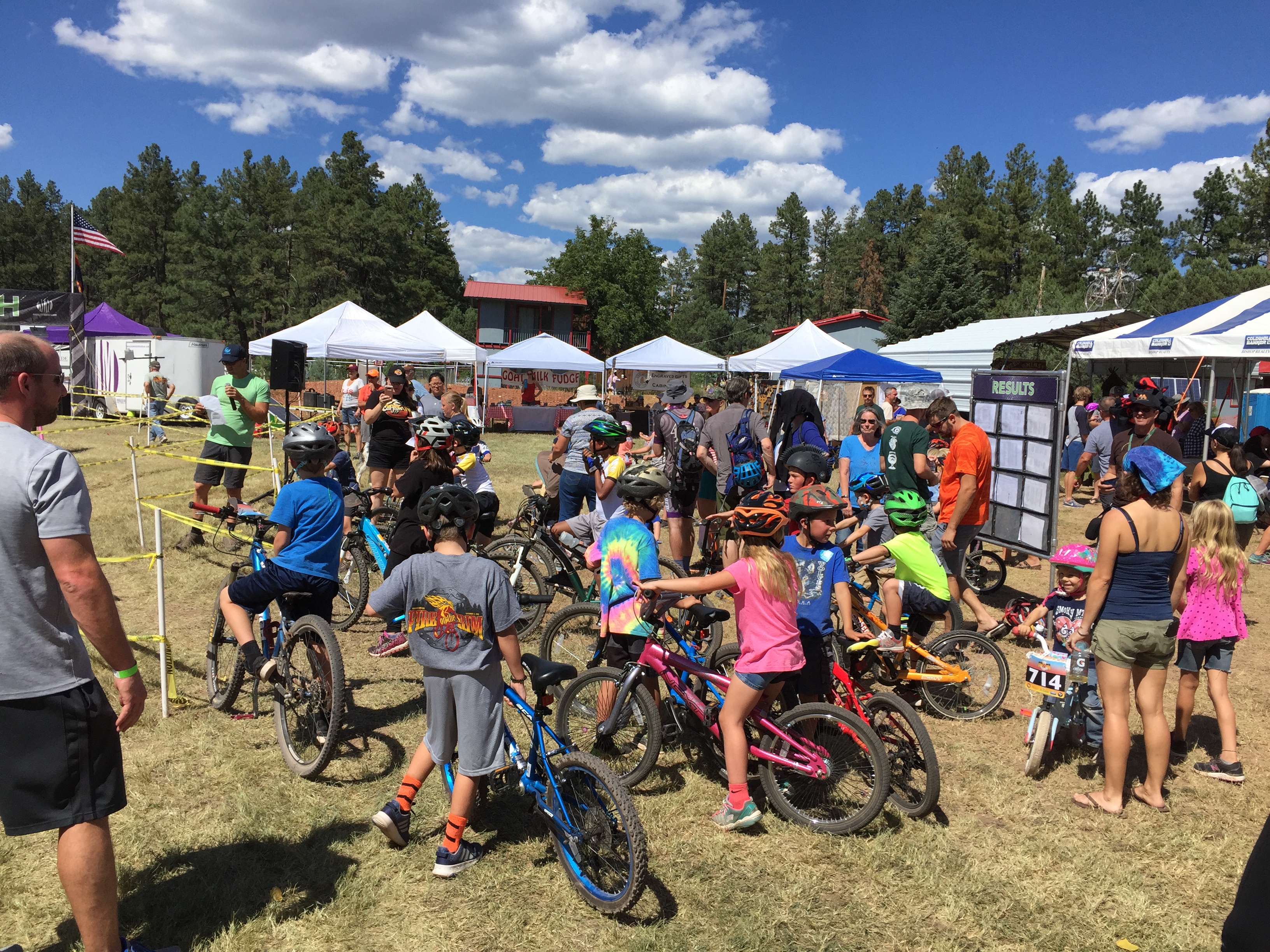 Bike safety booth and helmet giveaway during Fire on the Rim ride in Pine, Arizona in Sept 2018. Source: John Boyd