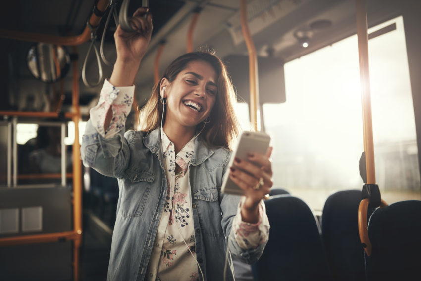 Latina woman riding bus public transit transportation