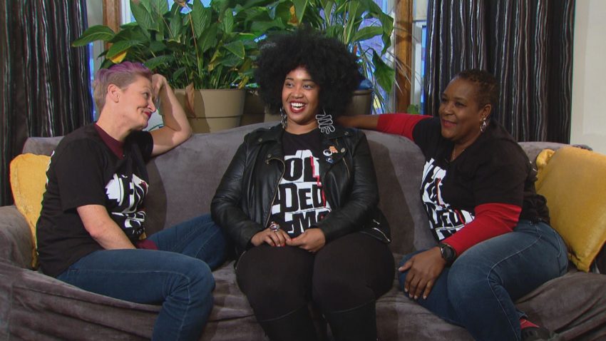 Tonika Johnson, center, with “map twins” Carmen Arnold-Stratton, right, and Bridghid O’Shaughnessy, left. (WTTW News)