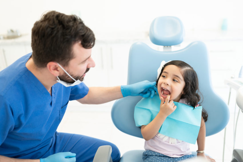latina girl at dentist cavities oral healrh dental health care teeth
