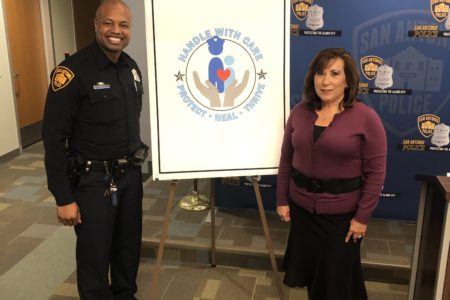Officer Doug Greene of San Antonio Police Department and Diana Centeno of San Antonio ISD