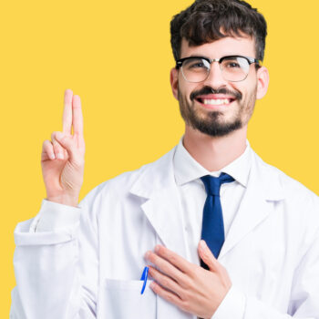 young male doctor swearing medical school oath