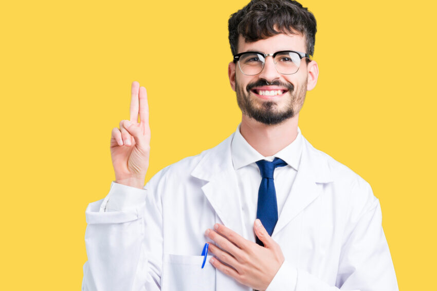 young male doctor swearing medical school oath
