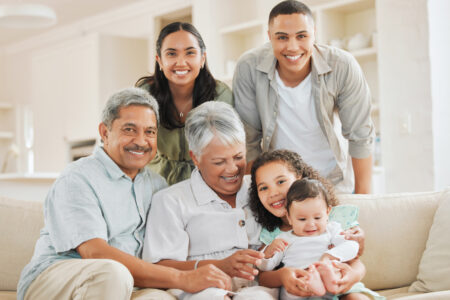 Latino family on couch.