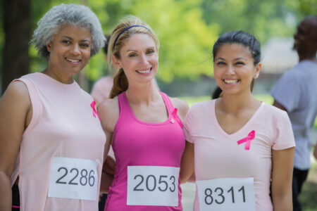 iverse women participating in breast cancer awareness race for a cure together