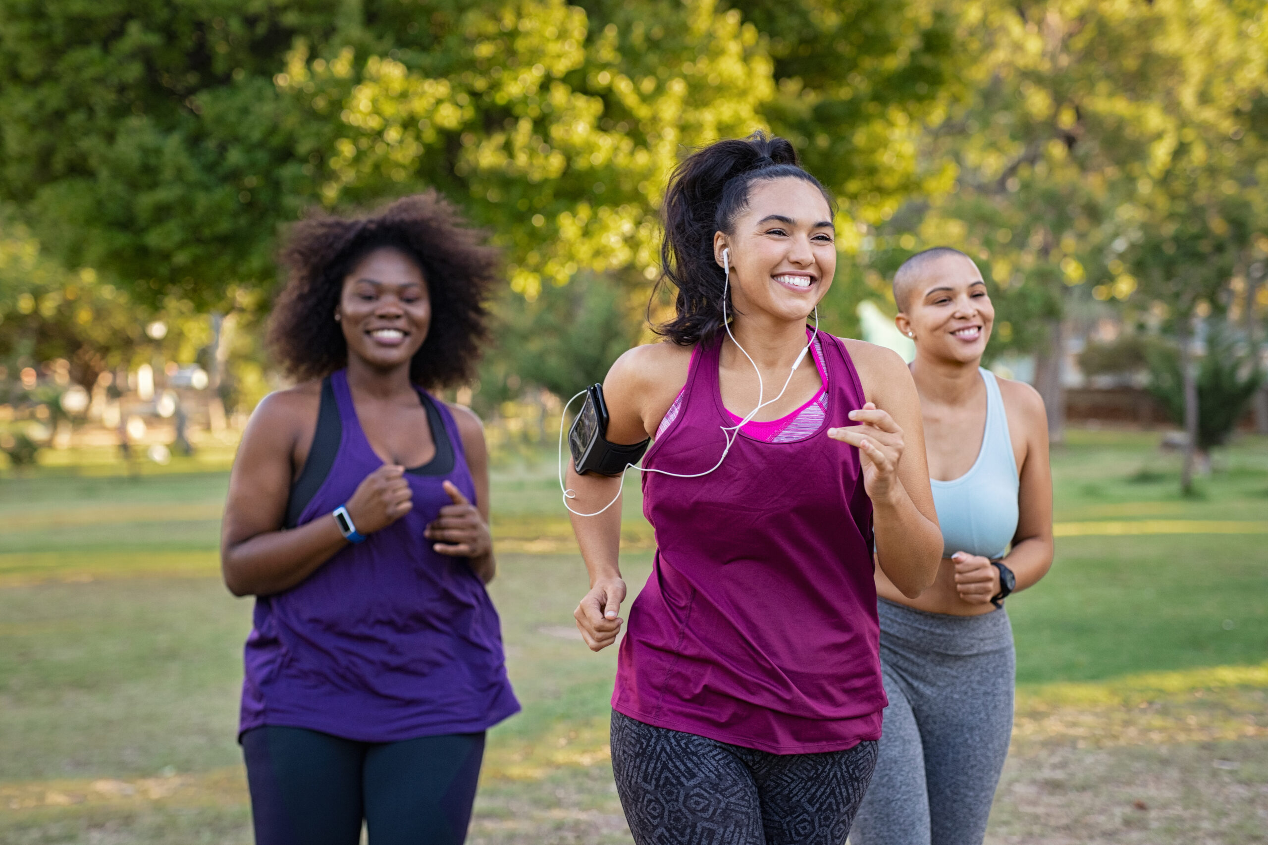 Group of women jogging in the park.