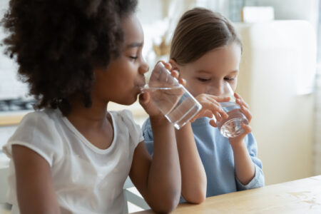 Children drinking water.