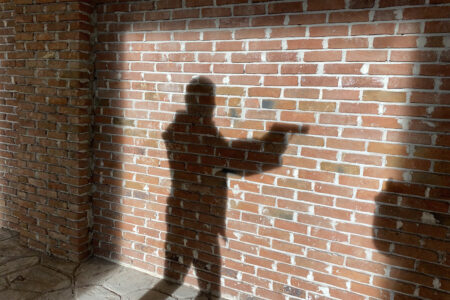 View of Man with Gun Silhouette