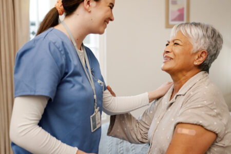 Happy senior woman, nurse or plaster for injection, vaccine or protection from virus germs. Elderly patient, smile or caregiver with bandage for inoculation, wellness or healthcare in retirement home