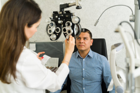 Man taking eye exam.