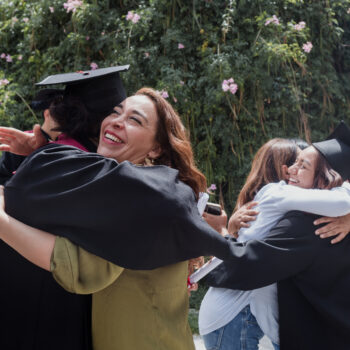Latino graduates celebrating