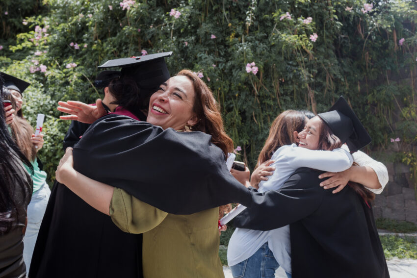 Latino graduates celebrating