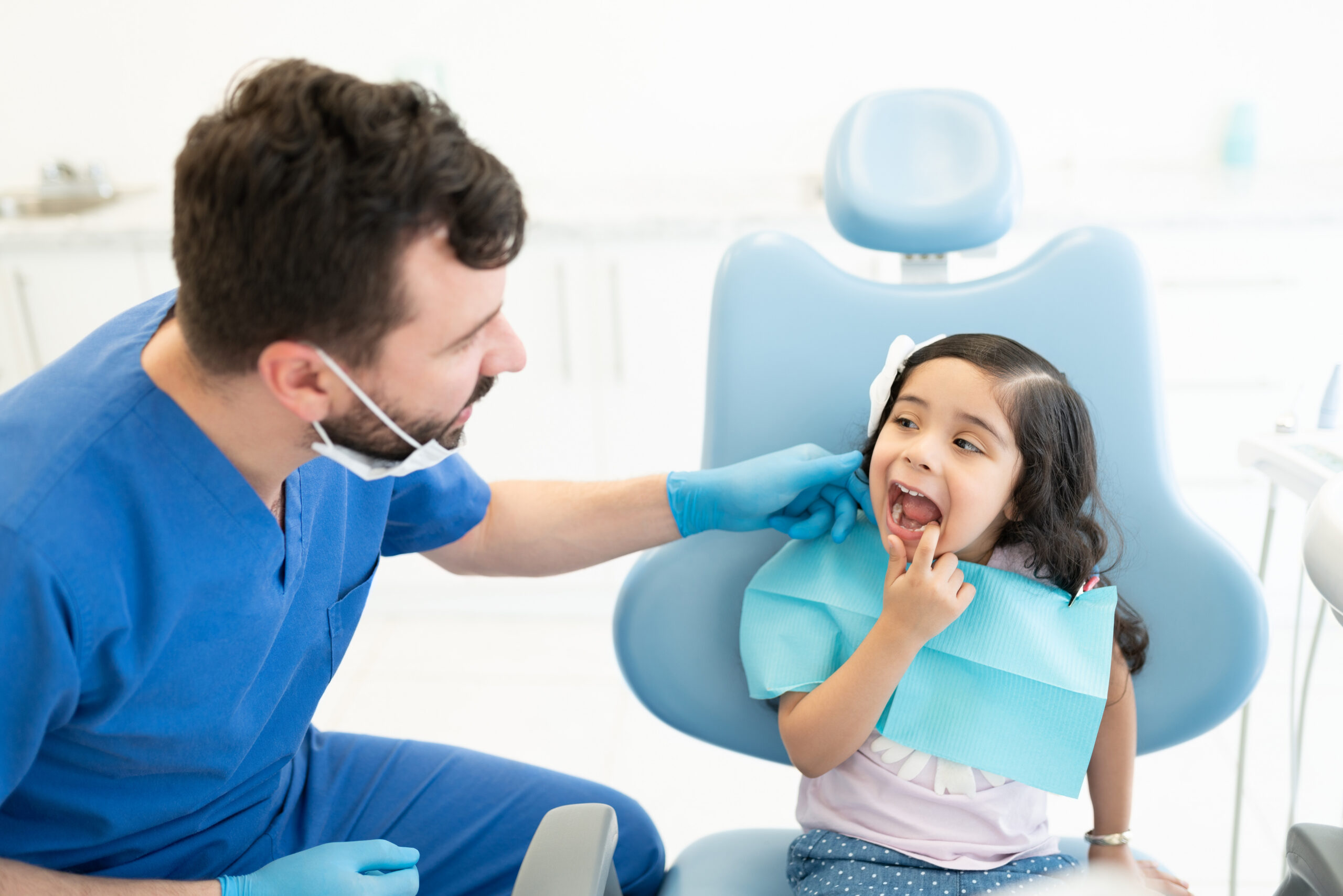 Young Latina girl at dental exam.