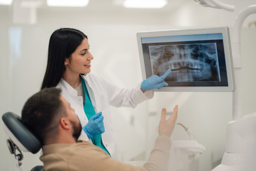 Latino man visiting dentist.